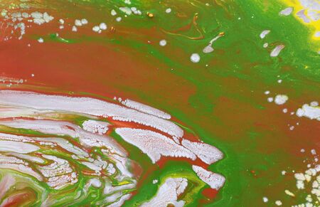 Photography of abstract marbleized effect background. Brown, orange, green and white creative...