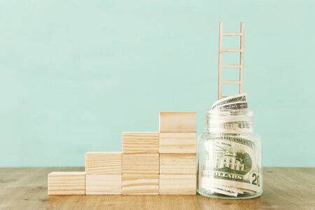 Business image of savings jar, money investment and financial growth conceptの写真素材