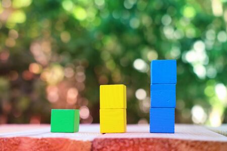 wood blocks stacking as step stairs. success and development conceptの写真素材