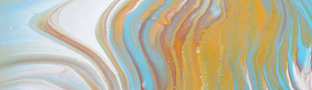 photography of abstract marbleized effect background. Blue, gold and white creative colors....