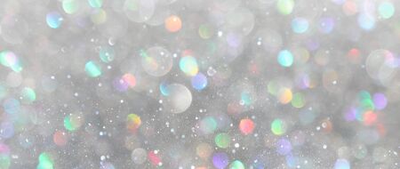 blackground of abstract glitter lights. silver and gold. de-focused. banner