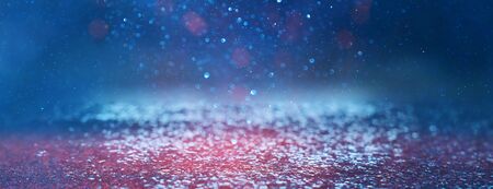 blackground of abstract glitter lights. blue, silver and black. de focused. banner