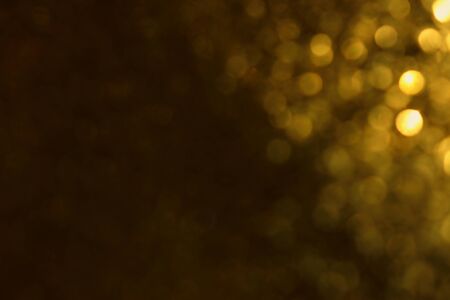 background of abstract glitter lights. gold and black. de focusedの写真素材