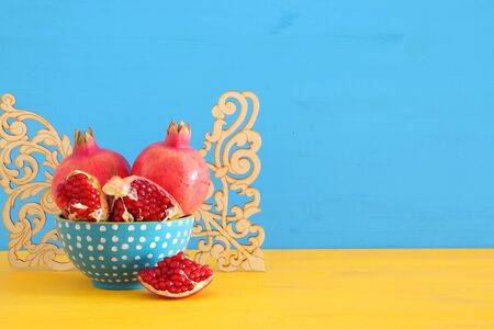 rosh hashanah (jewesh holiday) concept -pomegranate traditional holiday symbolの写真素材