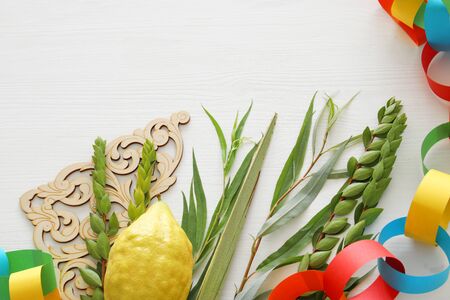 religion image of Jewish festival of Sukkot. Traditional symbols (The four species): Etrog, lulav, hadas, aravaの写真素材