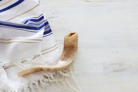 religion image of shofar (horn) on white prayer talit. Rosh hashanah (jewish New Year holiday), Shabbat and Yom kippur conceptの写真素材