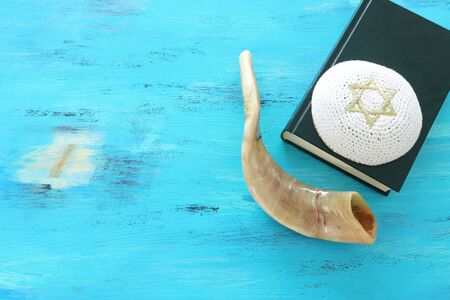 religion image of Prayer book and Shofar (horn) jewish religious symbols. Rosh hashanah (jewish New Year holiday), Shabbat and Yom kippur concept.の写真素材