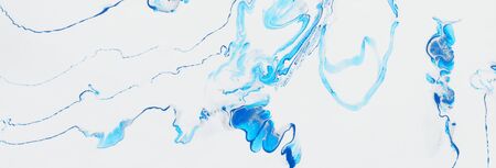 photography of abstract marbleized effect background. blue and white creative colors. Beautiful paint. bannerの写真素材
