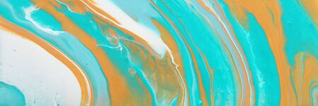 photography of abstract marbleized effect background. turquoise, gold, blue and white creative colors. Beautiful paint. bannerの写真素材