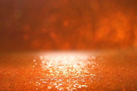 background of gold and orange glitter lights. de focusedの写真素材