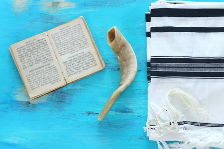 religion image of Prayer Shawl - Tallit, Prayer book and Shofar (horn) jewish religious symbols. Rosh hashanah (jewish New Year holiday), Shabbat and Yom kippur concept. bannerの写真素材