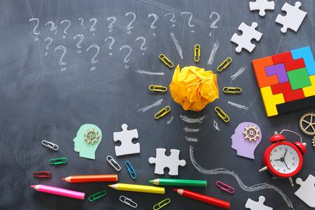 Education concept image. Creative idea and innovation. Crumpled paper as lightbulb metaphor over...