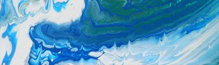 art photography of abstract marbleized effect background. blue and white creative colors. Beautiful...