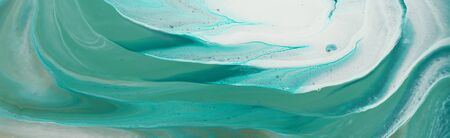 art photography of abstract marbleized effect background. turquoise, emerald green, white and gold creative colors. Beautiful paint. bannerの写真素材