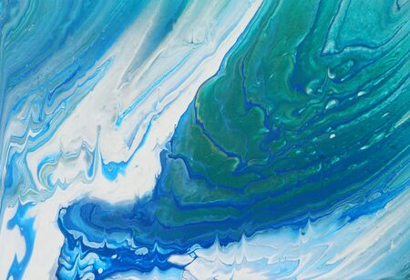 art photography of abstract marbleized effect background. turquoise, emerald green, blue, white and...