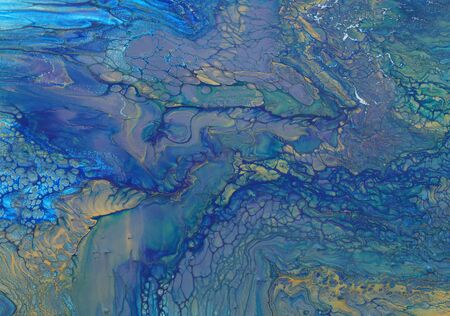 art photography of abstract marbleized effect background. blue and gold creative colors. Beautiful...