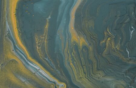 art photography of abstract marbleized effect background. gray, pewter blue and gold creative...
