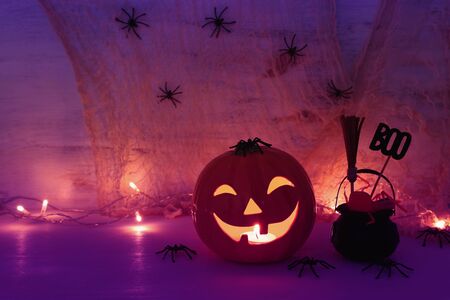 holidays halloween concept image. Pumpkin, spiders over wooden tableの写真素材