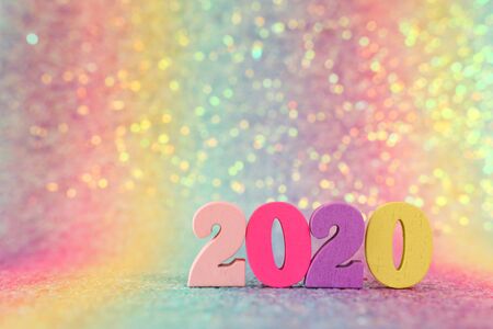 Holiday image of New Year 2020 concept. Wooden number and sparkling backgroundの写真素材