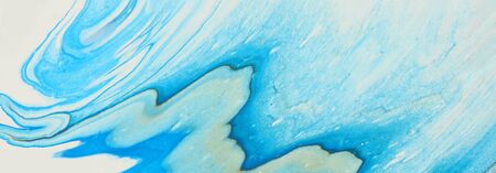 art photography of abstract marbleized effect background. white, blue and gold creative colors....