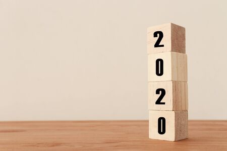 New year 2020 concept. business idea over wooden board
