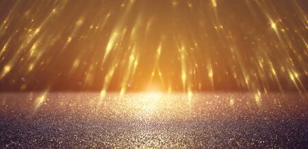 background of abstract glitter lights. gold and black. de focusedの写真素材