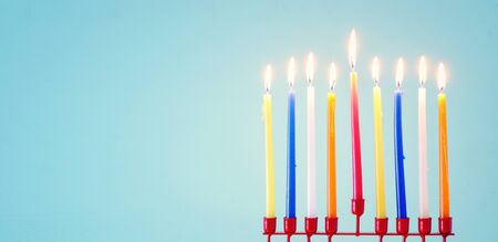 Religion image of jewish holiday Hanukkah background with menorah (traditional candelabra) and candlesの写真素材
