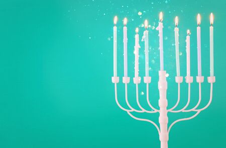 Religion image of jewish holiday Hanukkah background with menorah (traditional candelabra) and candlesの写真素材