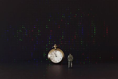 leadership business concept, man looking at clock, deadline and challenge ideaの写真素材