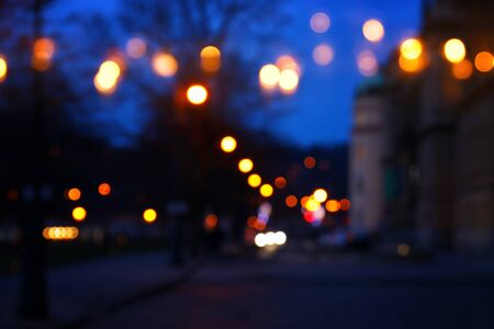 abstract background of colorful blurred defocused bokeh street lights. motion and nightlife concept.