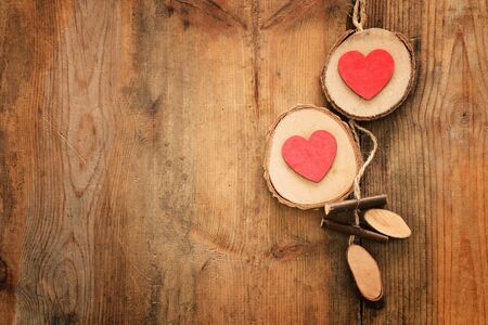 Valentines day concept. hearts over wooden background. Flat lay compositionの写真素材