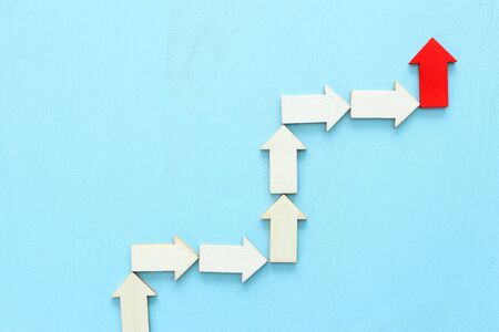 Business leadership concept, red arrow leader with group of followersの写真素材