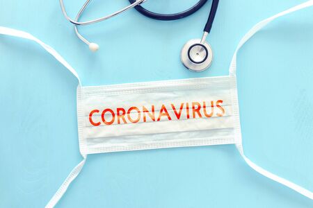 Medical concept of CoronaVirus written over face mask. Health care and medical conceptの写真素材