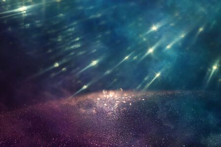 background of abstract glitter lights. gold and black. de focusedの写真素材