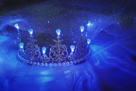 Vintage tulle mint chiffon dress and diamond tiara with glowing pearls. Wedding concept.の写真素材