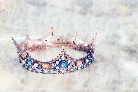 watercolor style and abstract image of beautiful queen/king crown. fantasy medieval periodの写真素材