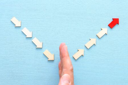 Business leaBusiness leadership concept, red arrow leader with group of followersdership concept,...