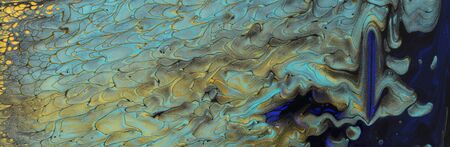 art photography of abstract marbleized effect background. Gold, black and blue creative colors....