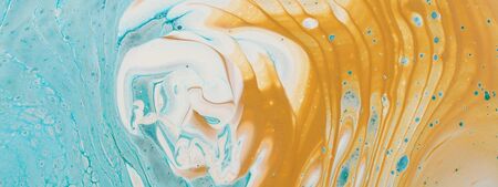 art photography of abstract marbleized effect background. Aqua, blue, gold and white creative colors. Beautiful paintの写真素材