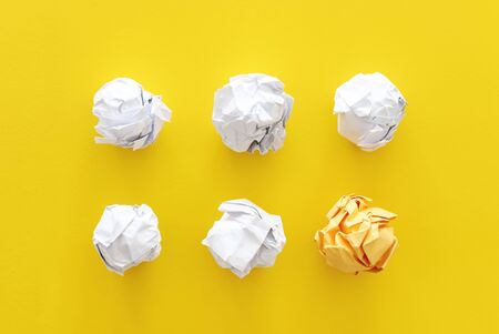 Inspiration concept crumpled paper as light bulb metaphor . finding the right ideaの写真素材