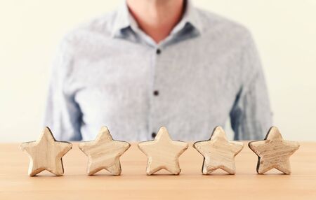concept image of setting a five star goal. increase rating or ranking, evaluation and classification ideaの写真素材