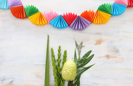 Jewish festival of Sukkot. Traditional symbols (The four species): Etrog (citron), lulav (palm...