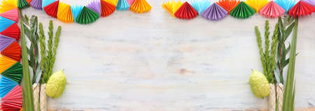 Jewish festival of Sukkot. Traditional symbols (The four species): Etrog (citron), lulav (palm...