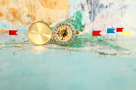 pins attached to map, showing location or travel destination . retro style image. selective focusの写真素材