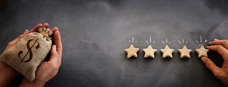 concept image of setting a five star goal. increase rating or ranking, evaluation and classification ideaの写真素材