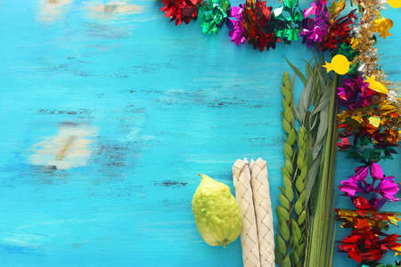 Jewish festival of Sukkot. Traditional symbols (The four species): Etrog (citron), lulav (palm...