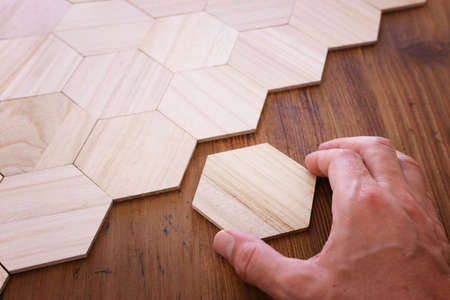 background of wooden puzzle with missing pieces