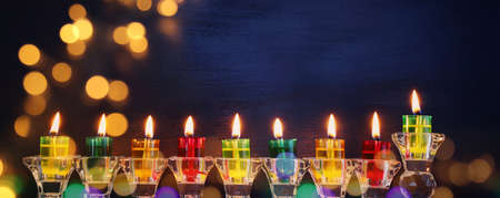Religion image of jewish holiday Hanukkah background with menorah (traditional candelabra) and candlesの写真素材