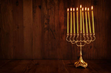 Religion image of jewish holiday Hanukkah background with menorah (traditional candelabra) and candlesの写真素材