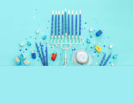 Religion image of jewish holiday Hanukkah background with menorah (traditional candelabra) and candlesの写真素材